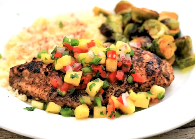 27 Flavorful Sweet and Spicy Chicken Dishes for Bold Tastes Pineapple Salsa Chicken