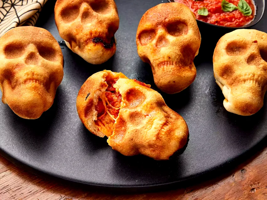 23 Spooky Halloween Party Foods for Your Frightful Feast Pizza Skulls