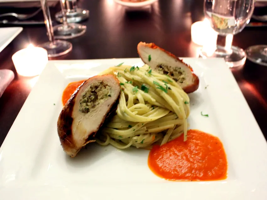 17 Elegant Chicken Dishes With Five-Star Reviews Prosciutto-Wrapped Chicken Breasts With Herbed Goat Cheese