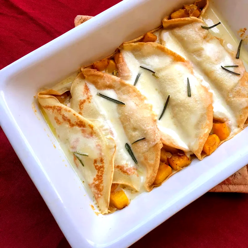 Pumpkin Crepes with Fontina Cheese Sauce