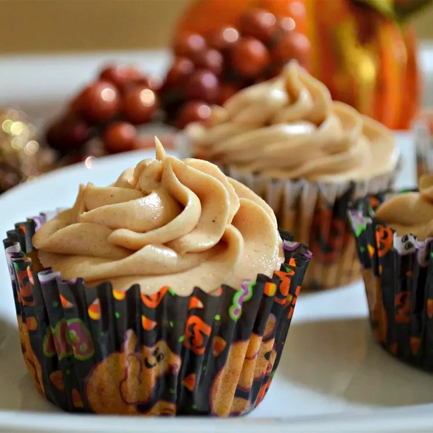 23 Spooky Halloween Party Foods for Your Frightful Feast Pumpkin Spice Cupcakes With Cream Cheese Frosting