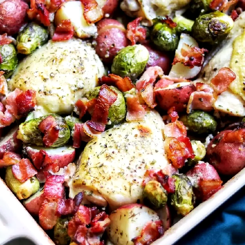 28 Delicious Bone-In Chicken Thigh Recipe Ideas Ranch-Baked Chicken Thighs with Bacon, Brussels Sprouts, and Potatoes