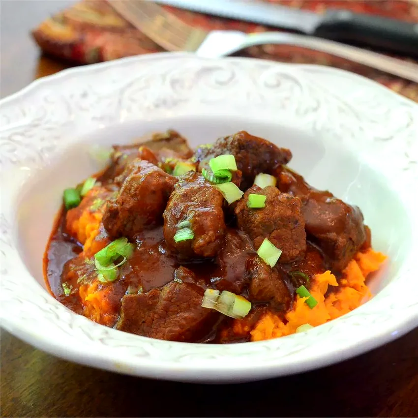 10 Sweet Potato Mash Recipes for Every Season and Occasion Red Chile Braised Beef Stew Over Mashed Sweet Potatoes
