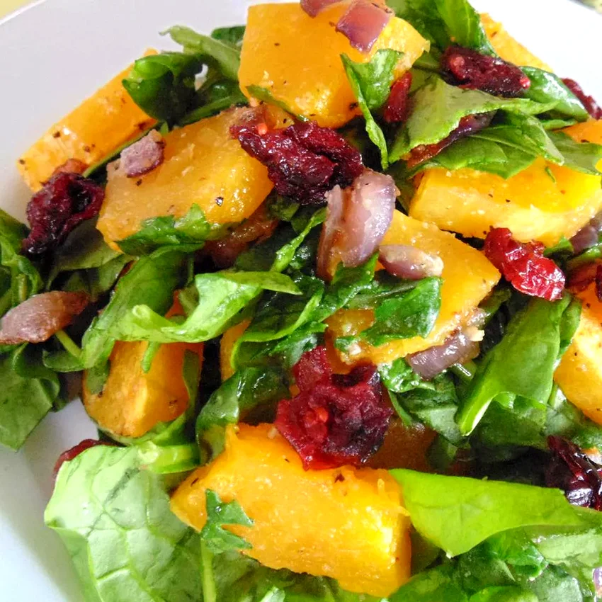 Top 50 Holiday Side Dishes for Thanksgiving Dinner Roasted Butternut Squash with Onions, Spinach, and Cranberries