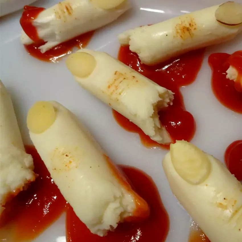 24 Spooky Halloween Dinner & Party Ideas That Will Wow Severed-Finger Cheese Sticks