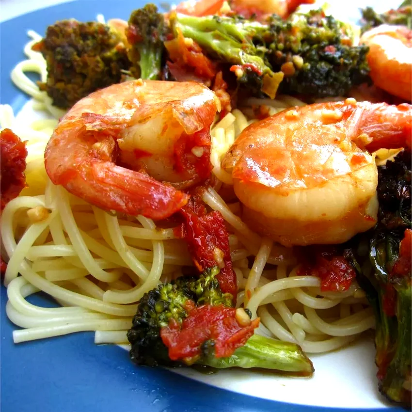 15 Fast Shrimp Pasta Dishes Ready in 30 Minutes Shrimp, Broccoli, and Sun-Dried Tomatoes Scampi with Angel Hair