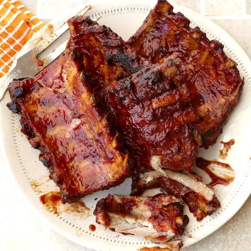 24 Crockpot Game Day Favorites for Your Next Tailgate Slow-Cooker Barbecue Ribs
