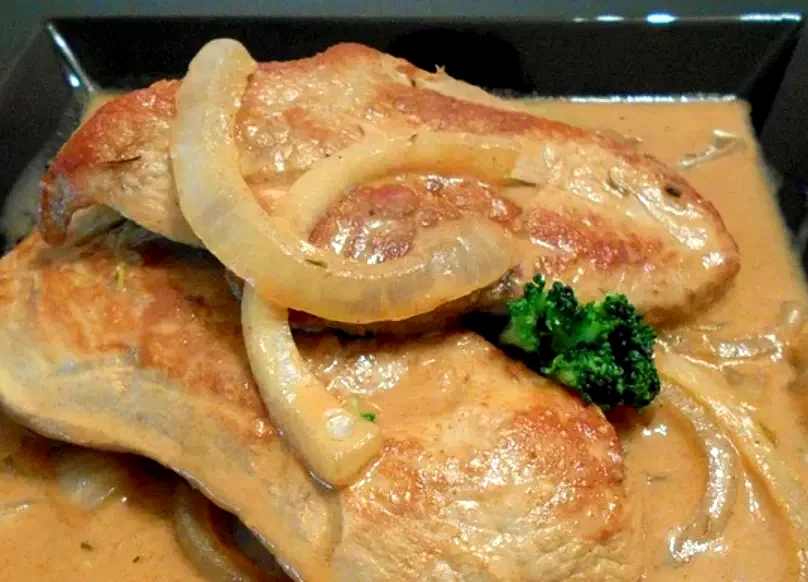 10 Sweet Vidalia Onion Dishes Everyone Will Adore Sour Cream Pork Chop and Vidalia Onion Gravy