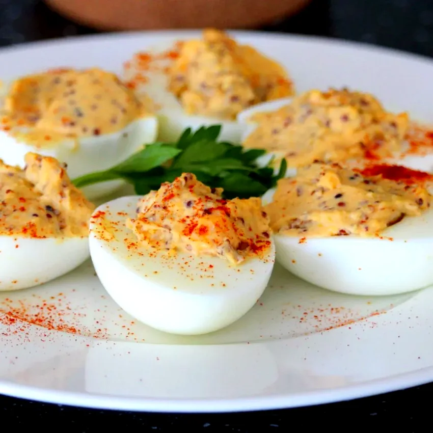 30 Crowd-Pleasing Party Appetizers Your Guests Adore Sriracha Deviled Eggs