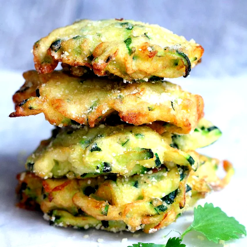 24 Amazing Fritter Recipes for Every Craving Zucchini-Parmesan Cheese Fritters