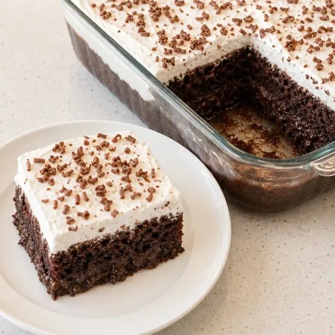 Rich Chocolate Poke Cake with Fluffy Whipped Topping Chocolate Poke Cake