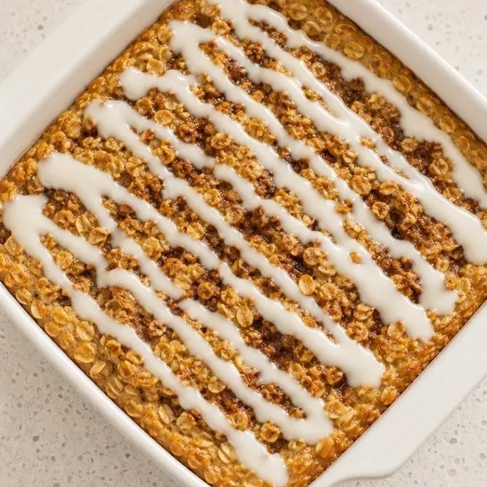 Cinnamon Roll Baked Oatmeal with Cream Cheese Glaze Cinnamon Roll Baked Oatmeal