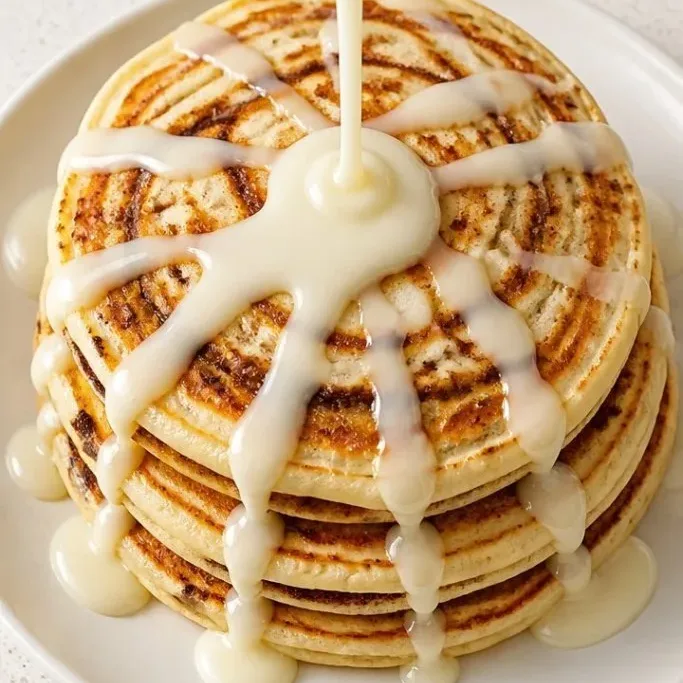 Fluffy Cinnamon Roll Pancakes with Cream Cheese Glaze Cinnamon Roll Pancakes