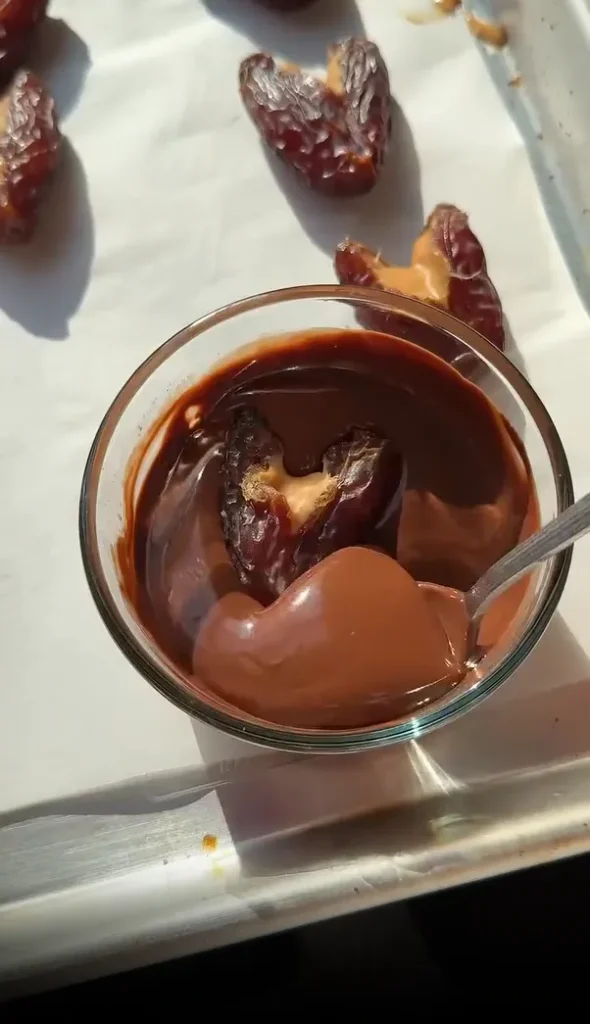 drop a heart into the melted chocolate