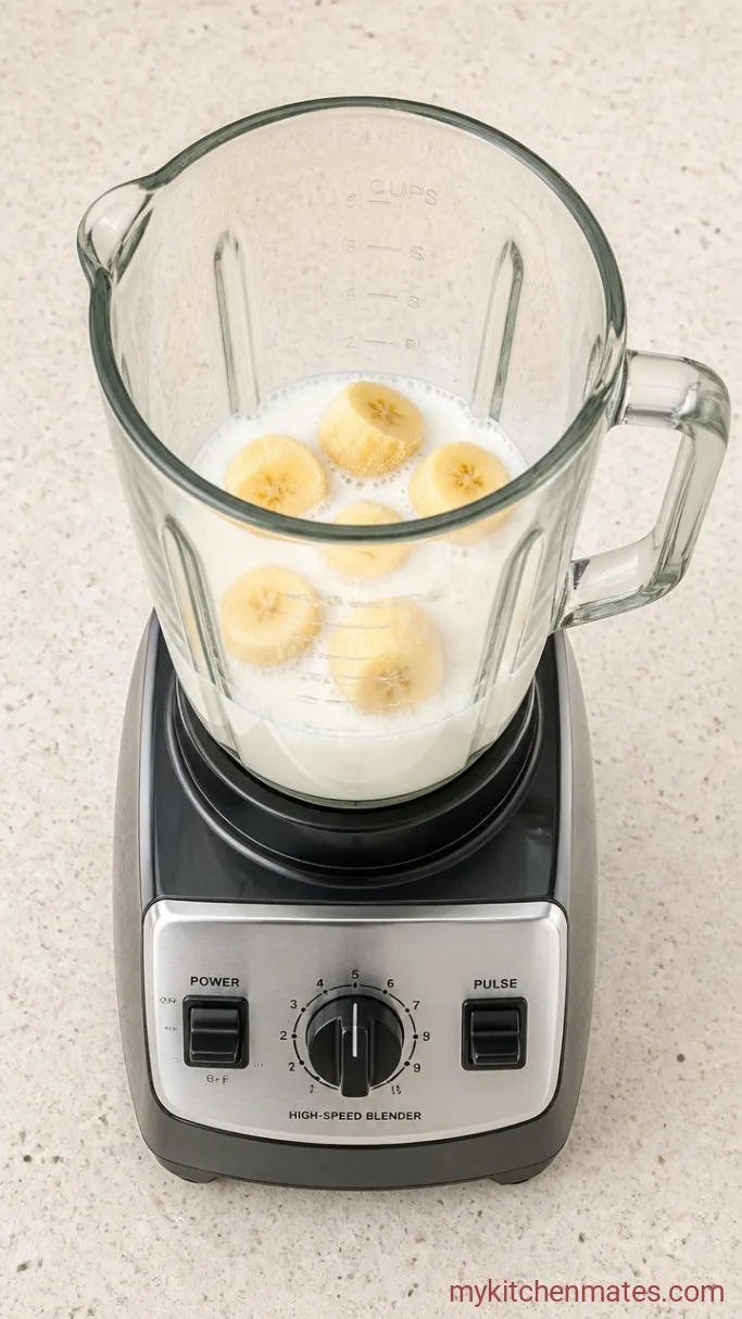 Step 1: Add the Milk and Banana First