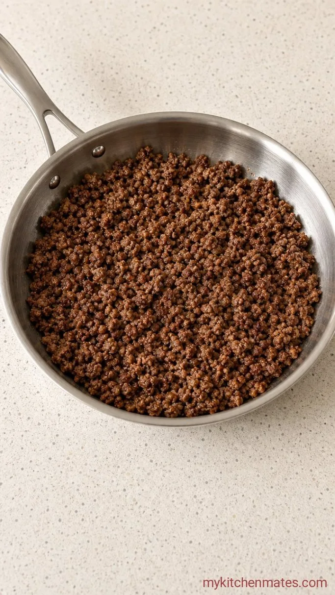 Crockpot Hamburger Helper: Creamy, Cheesy One-Pot Meal Step 1: Brown the Ground Beef