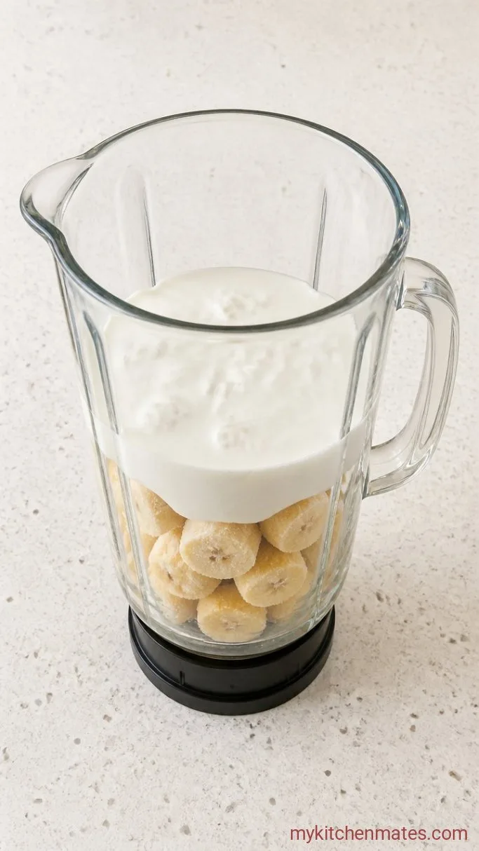 Creamy 4-Ingredient Coconut Milk Smoothie Step 1: Layer the Blender