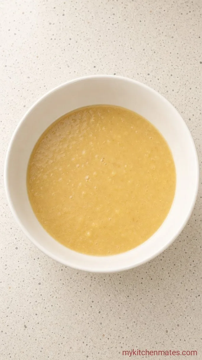 Step 1: Mash the Bananas and Mix the Wet Ingredients