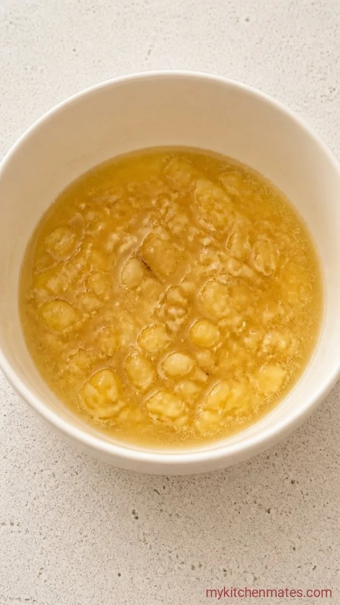 Set It and Forget It: Bread Machine Banana Bread Step 1: Mash the Bananas and Mix the Wet Ingredients
