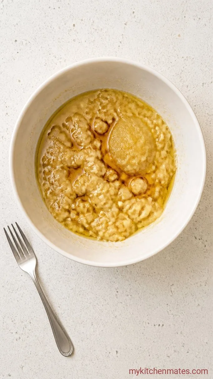 Step 1: Mash the Bananas and Mix the Wet Ingredients