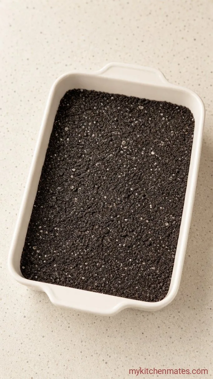 5-Ingredient Oreo Dump Cake Step 1: Press the Oreo Crust