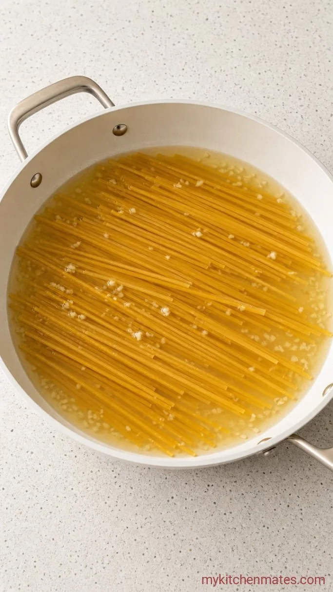 One-Pot Creamy Broccoli Alfredo Pasta Step 1: Sauté the Garlic and Start the Pasta