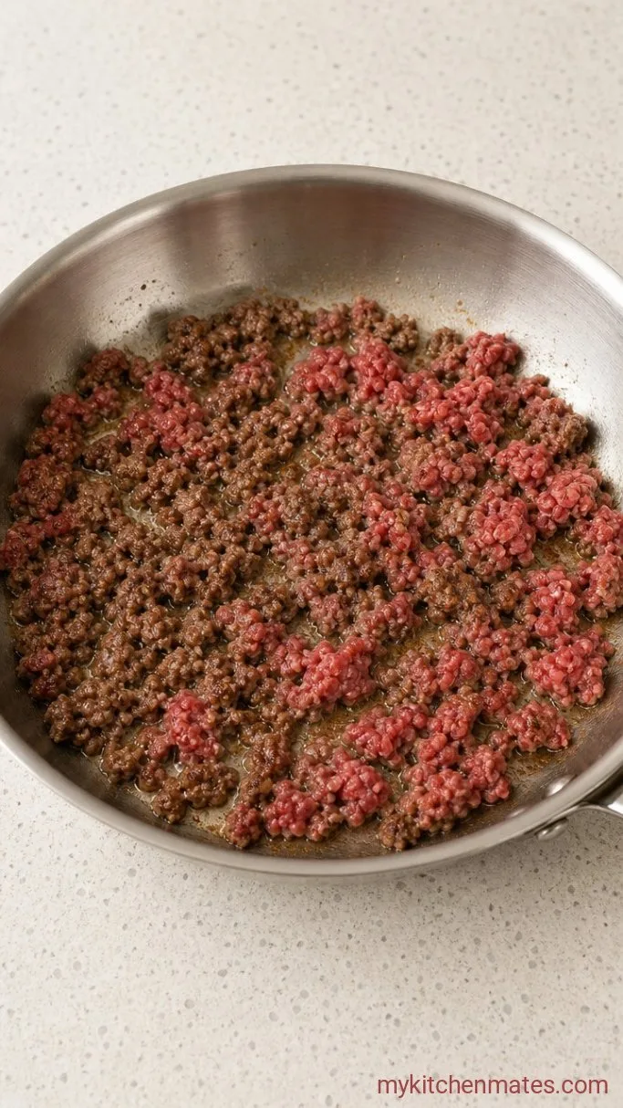 One-Pot Creamy Garlic Beef Pasta Step 1: Sear the Beef