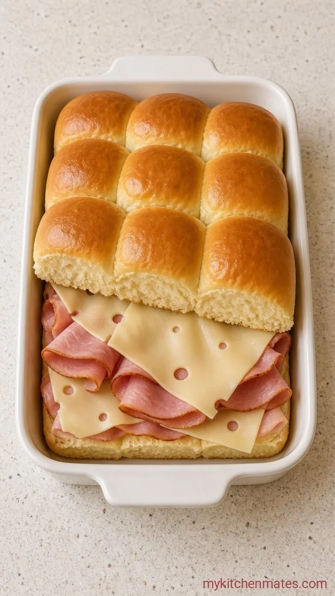 Baked Ham and Cheese Hawaiian Rolls with Buttery Poppy Seed Glaze Step 1: Slice and Layer the Rolls
