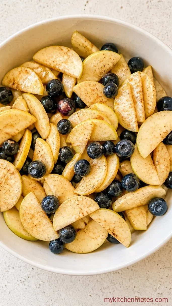 Apple Blueberry Crisp with Oat Crumble Step 1: Toss the Fruit Filling