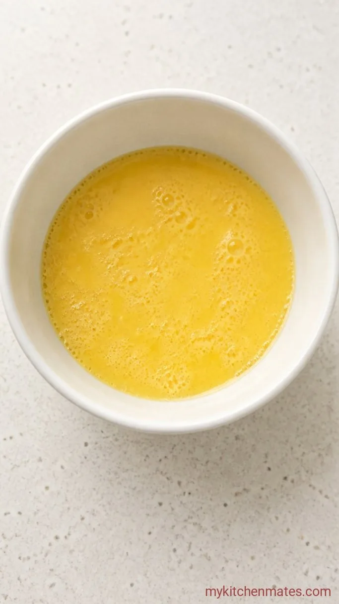 5-Minute Fluffy Egg Drop Sandwich Step 1: Whisk the Eggs