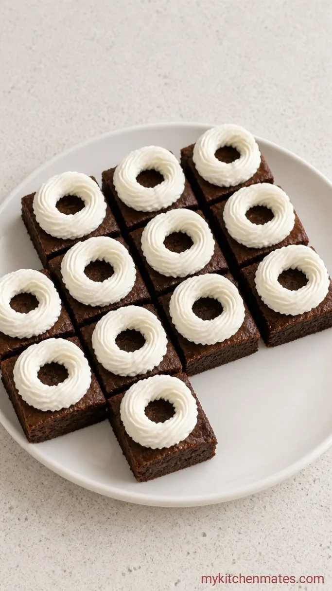 Brownie Santa Hats (A Simple Holiday Treat) Step 3: Cut the Brownies and Pipe the Cream Brim