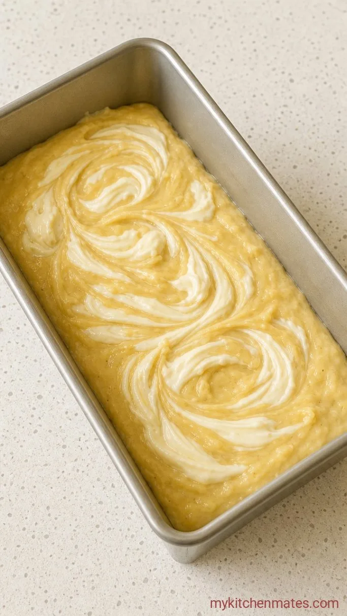 Cream Cheese Banana Bread with a Tangy Swirl Step 3: Layer and Swirl the Loaf