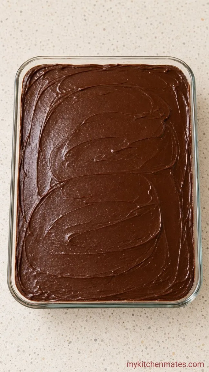 5-Ingredient No-Bake Chocolate Eclair Cake Step 4: Frost the Cake