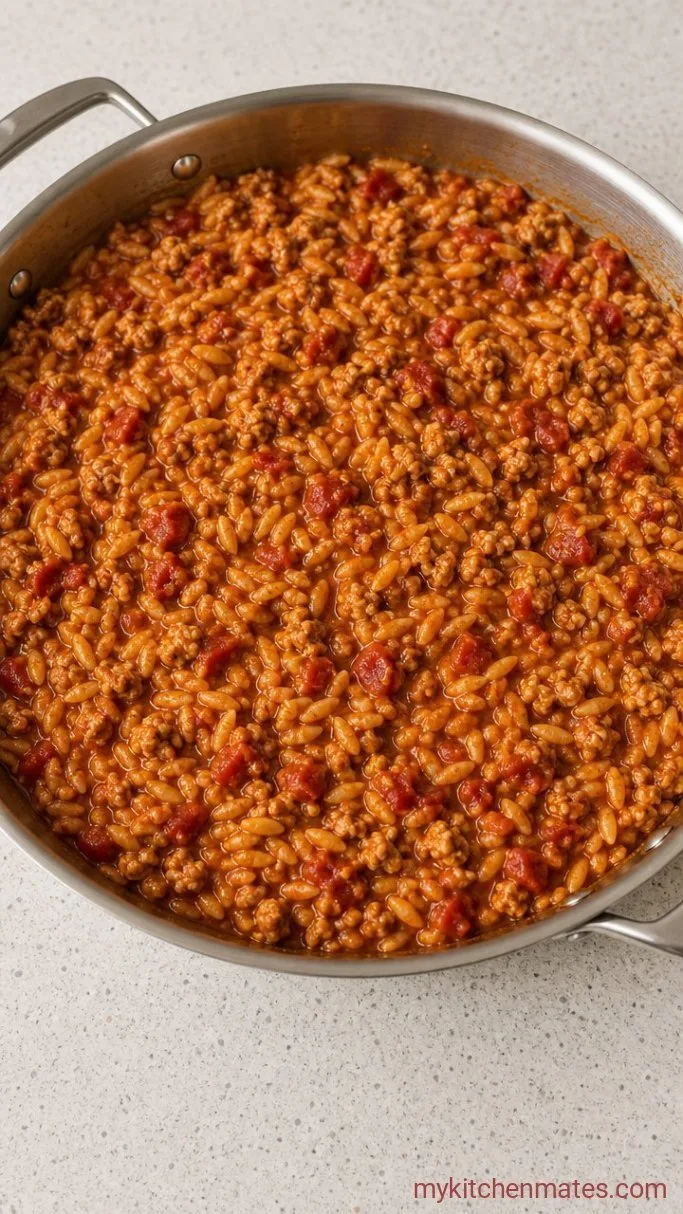 30-Minute One-Skillet Ground Turkey Orzo Step 4: Simmer with Broth and Tomatoes